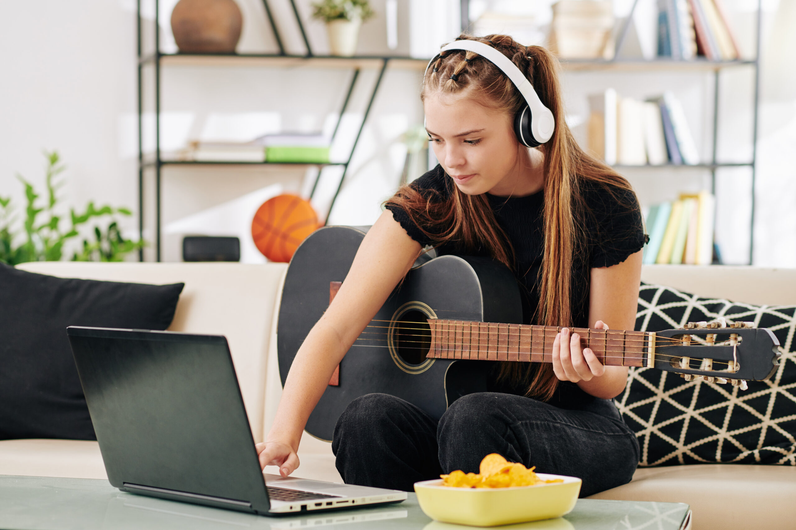 Teenage girl writing new song
